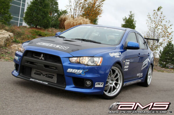 Alternative view of AMS Performance 08-15 Mitsubishi EVO X Front Mount Intercooler w/Modular Cast End Tanks & Logo