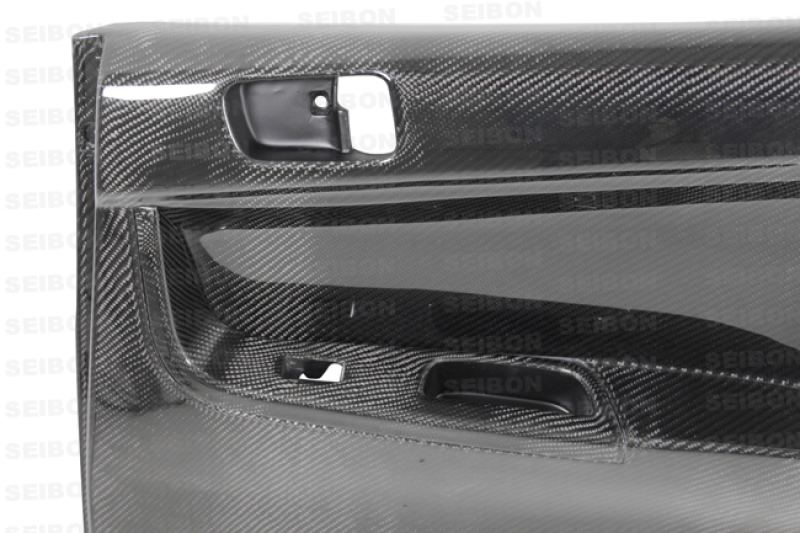Seibon 08-12 Mitsubishi Evo Carbon Fiber Rear Door Panels