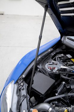 Seibon Universal Carbon Fiber Hood/Truck Prop - Image 6