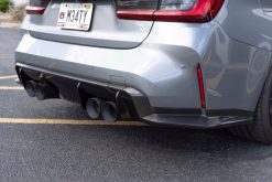 Dinan 21-27 BMW M3/M4 (G80/G82/G83) Carbon Fiber Rear Diffuser Surround - Image 11