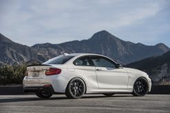 Alternative view of Dinan 14-16 BMW M235i (F22) w/o M-Performance Valence Free Flow Axleback Exhaust System - Black Tips