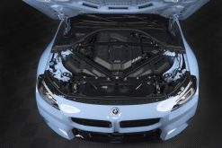 Alternative view of Dinan 21-27 BMW M2/M3/M4 (G80/G82/G87) Matte Carbon Fiber Engine Cover w/Gloss Accents